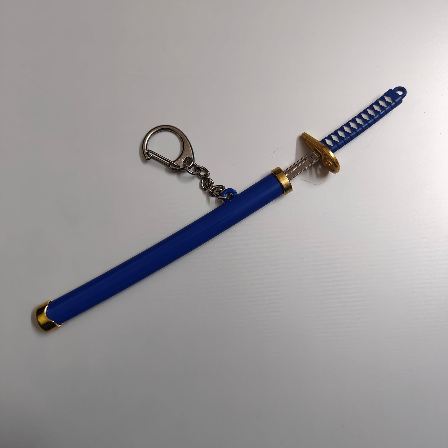 One Piece Mini Katana Sword Keychain – Roronoa Zoro's Iconic Blade (Blue) - Otaku Haven
