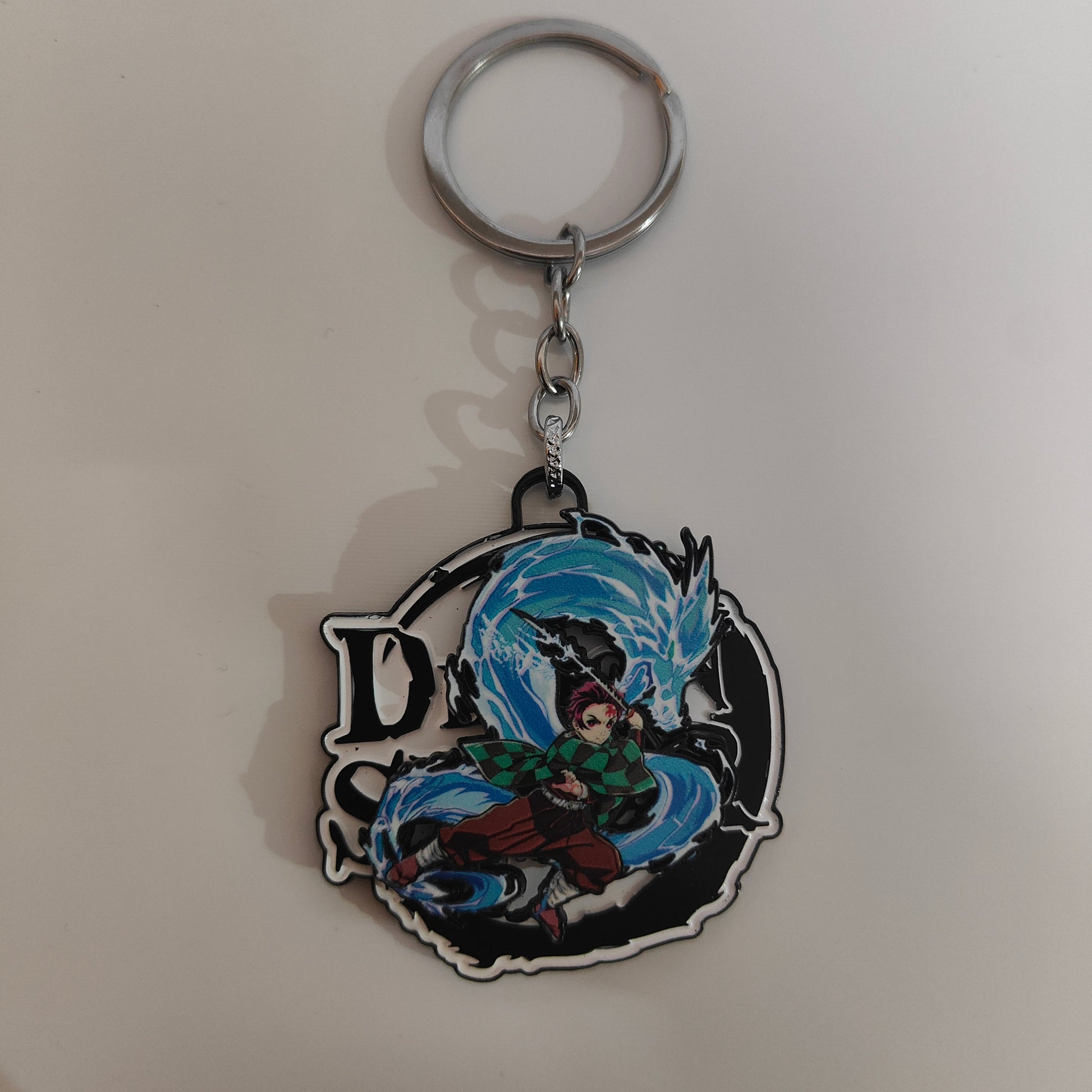 Tanjiro Kamado Spinning Metal Keychain – Water Breathing Dragon Form – Demon Slayer Merchandise - Otaku Haven