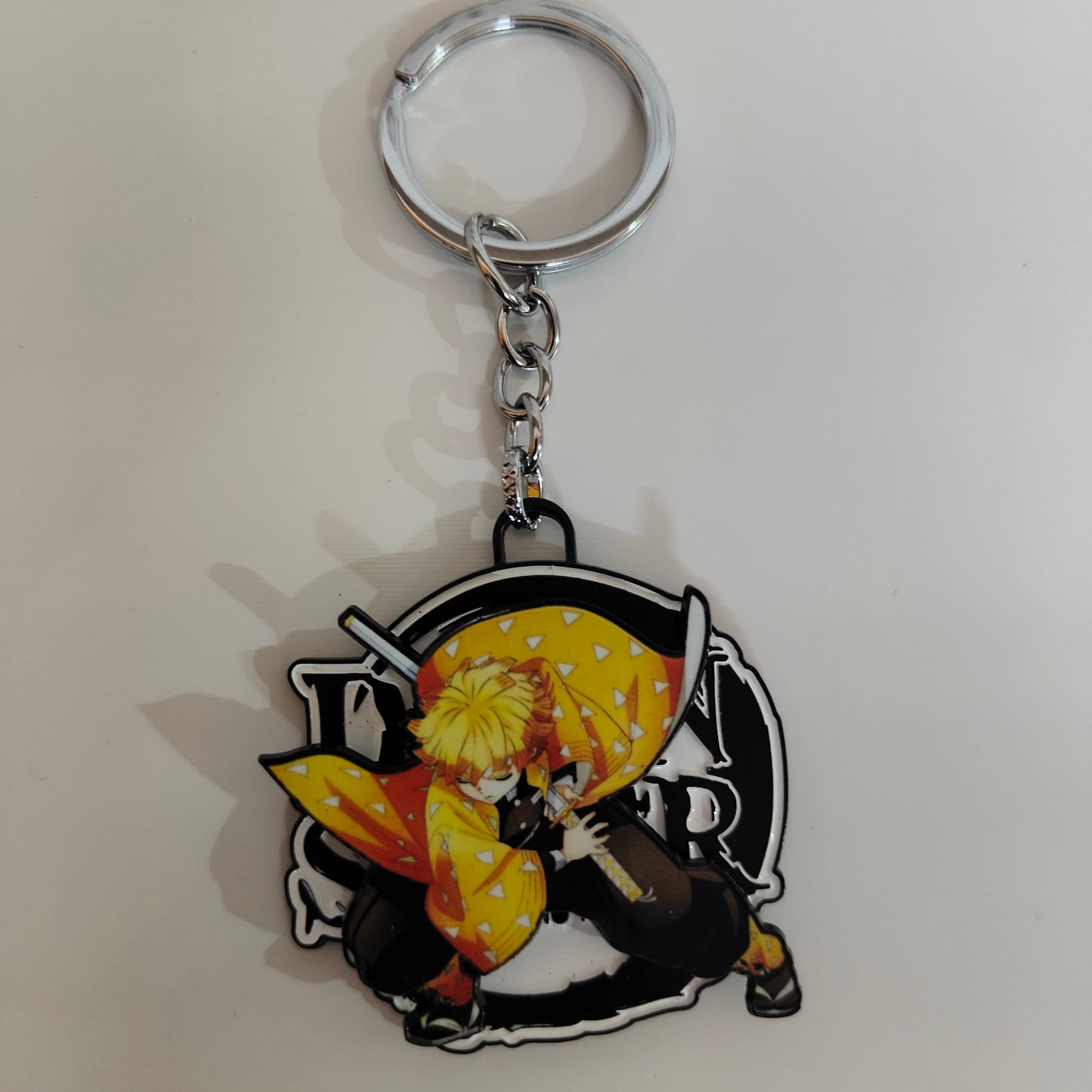 Zenitsu Agatsuma Spinning Metal Keychain – Sleeping Warrior Pose – Demon Slayer Merchandise - Otaku Haven