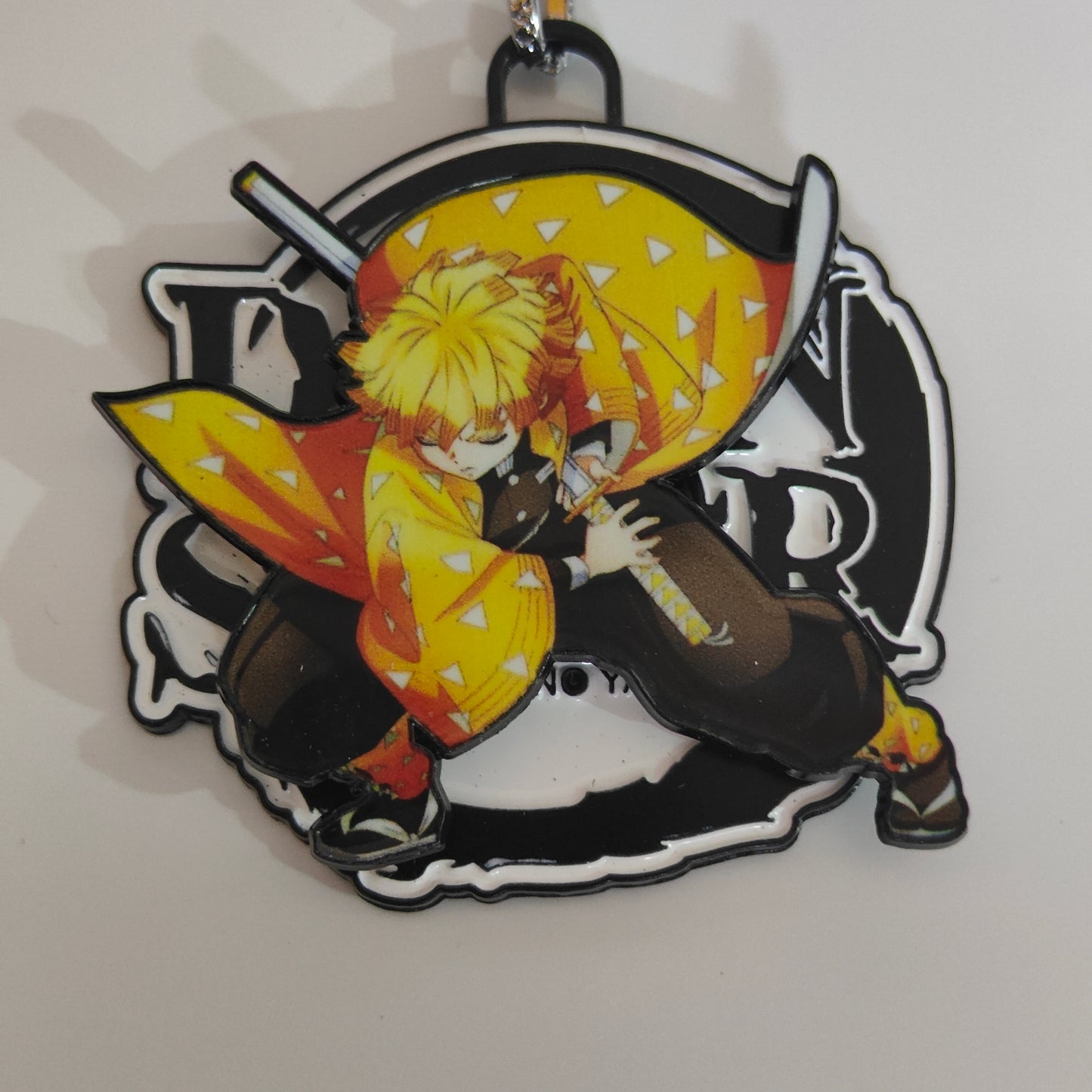 Zenitsu Agatsuma Spinning Metal Keychain – Sleeping Warrior Pose – Demon Slayer Merchandise - Otaku Haven