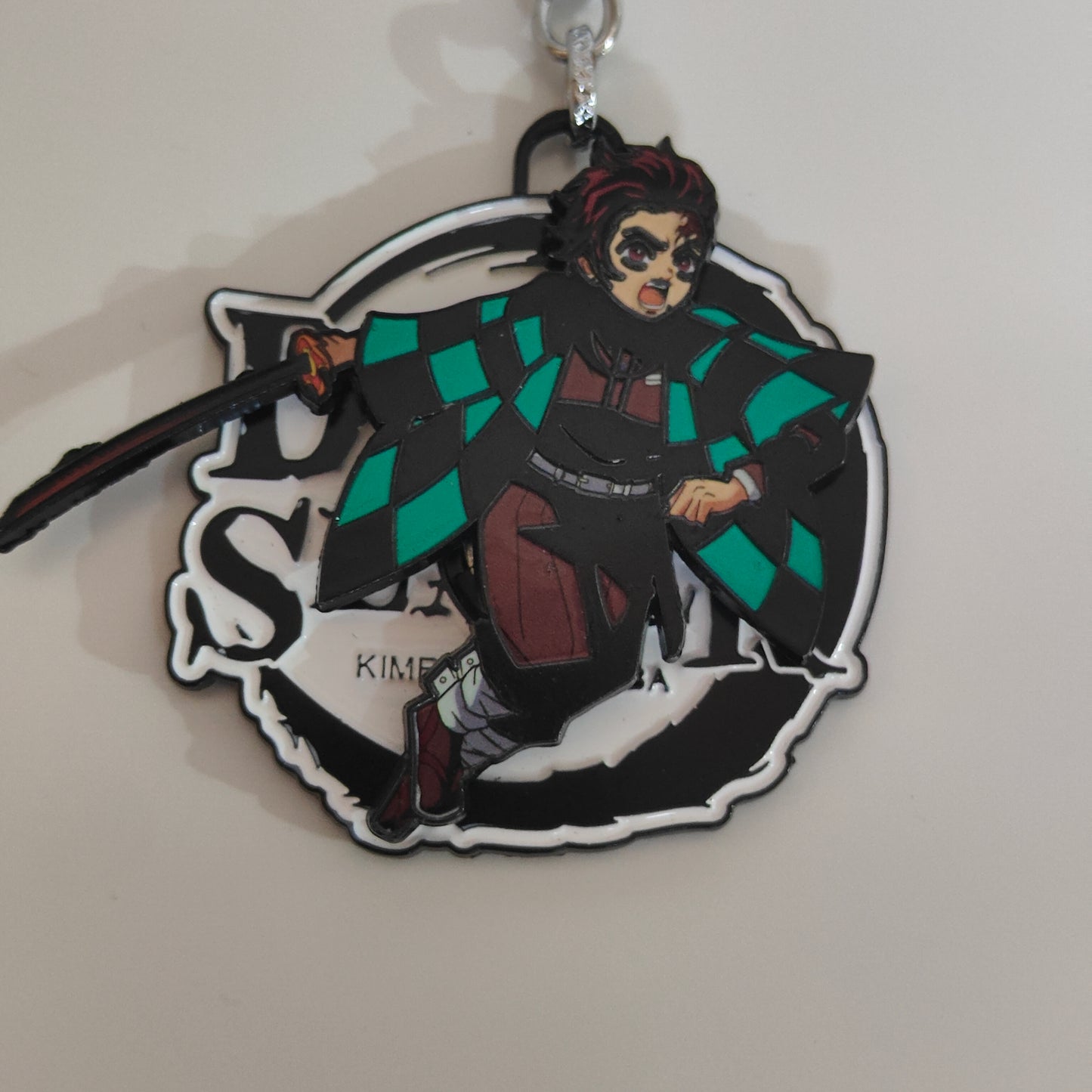 Tanjiro Kamado Spinning Metal Keychain – Fierce Tackle Stance – Demon Slayer Merchandise - Otaku Haven