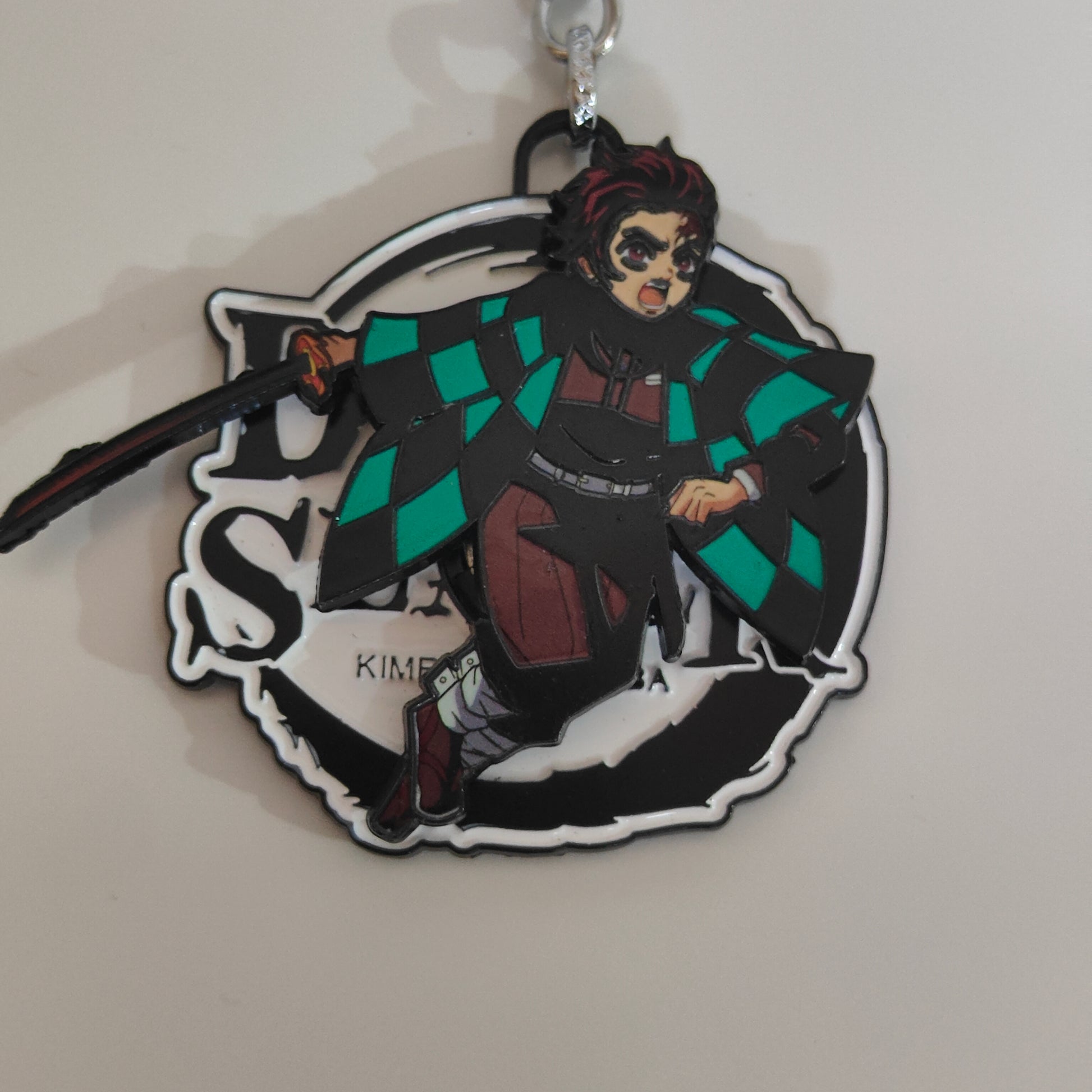 Tanjiro Kamado Spinning Metal Keychain – Fierce Tackle Stance – Demon Slayer Merchandise - Otaku Haven