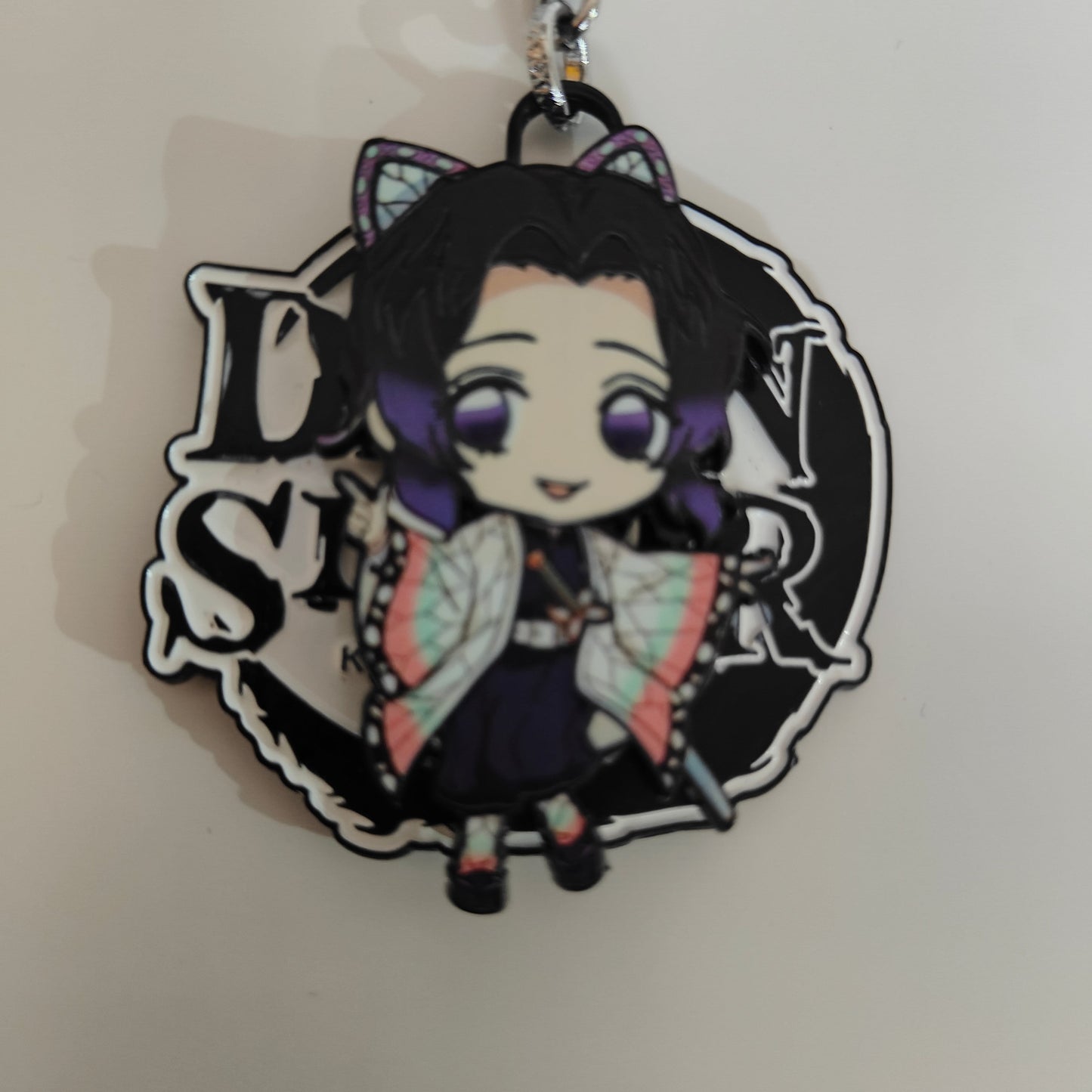 Shinobu Kocho Spinning Metal Keychain – Demon Slayer Merchandise - Otaku Haven